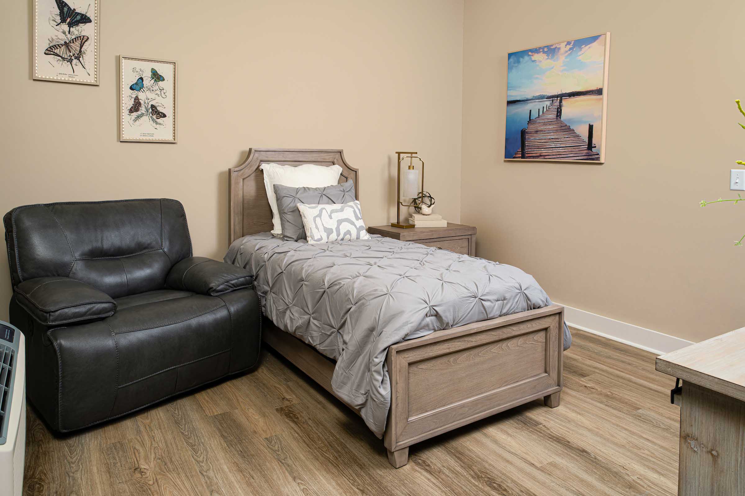 Willows-Interior-230 a room with a bed and a couch